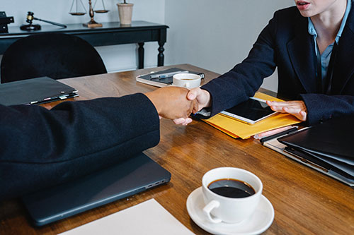 two people shaking hands