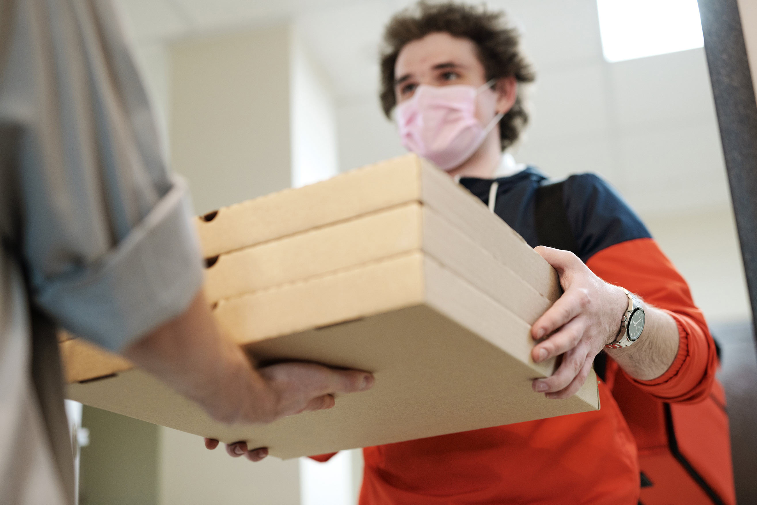 Man delivering pizza